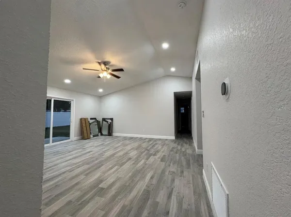 a view of a livingroom with a ceiling fan