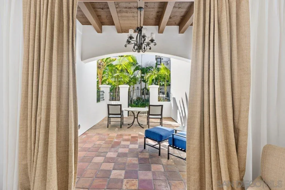 7319 Estrella De Mar Road Carlsbad, CA 92009 - Photo 12 of 13 a view of a balcony with chairs and a table