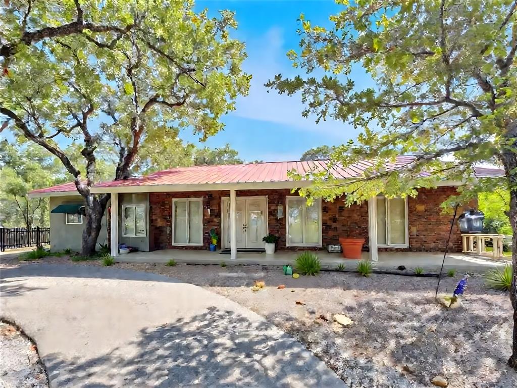 5167 Rockhill Road Aubrey, TX 76227 - Photo 2 of 29 a front view of a house with garden