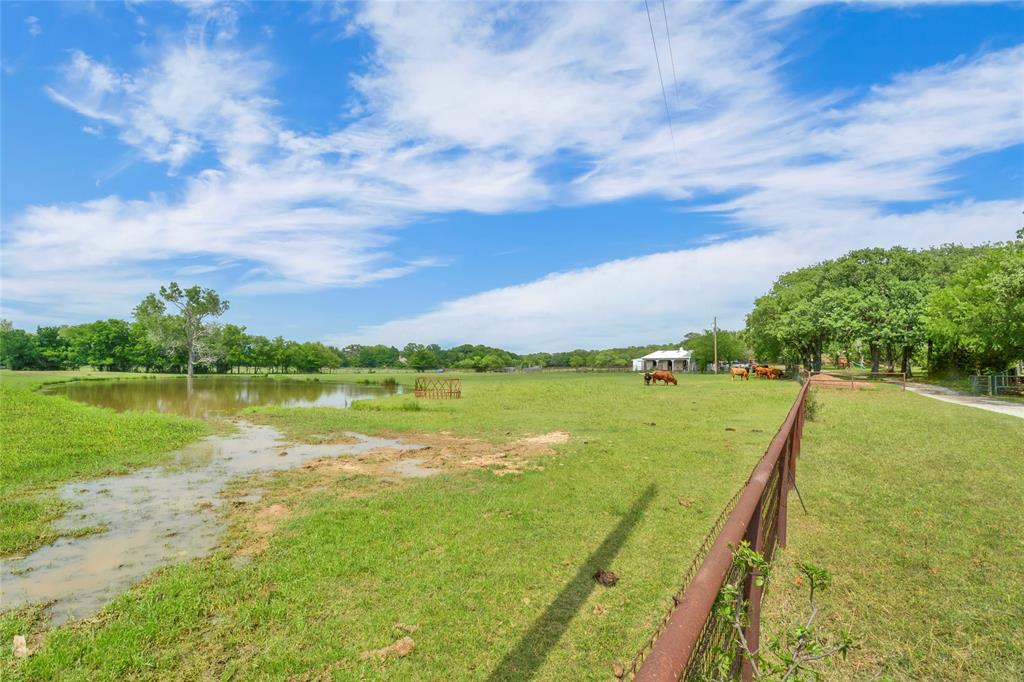5167 Rockhill Road Aubrey, TX 76227 - Photo 25 of 29 a view of an ocean from a balcony