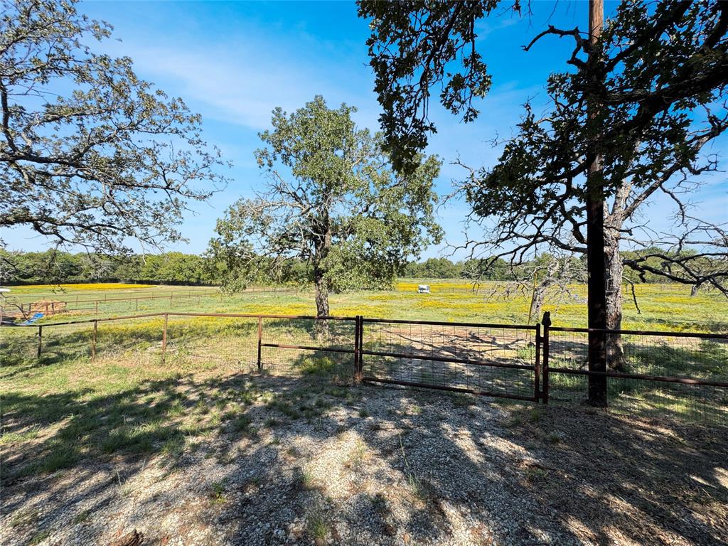 5167 Rockhill Road Aubrey, TX 76227 - Photo 3 of 29 a view of swimming pool with an outdoor space and seating area