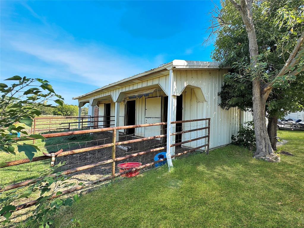 5167 Rockhill Road Aubrey, TX 76227 - Photo 6 of 29 a view of a house with a yard