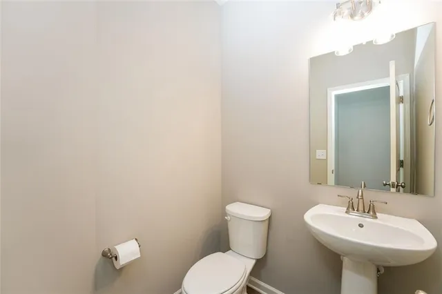 a bathroom with a sink and a toilet