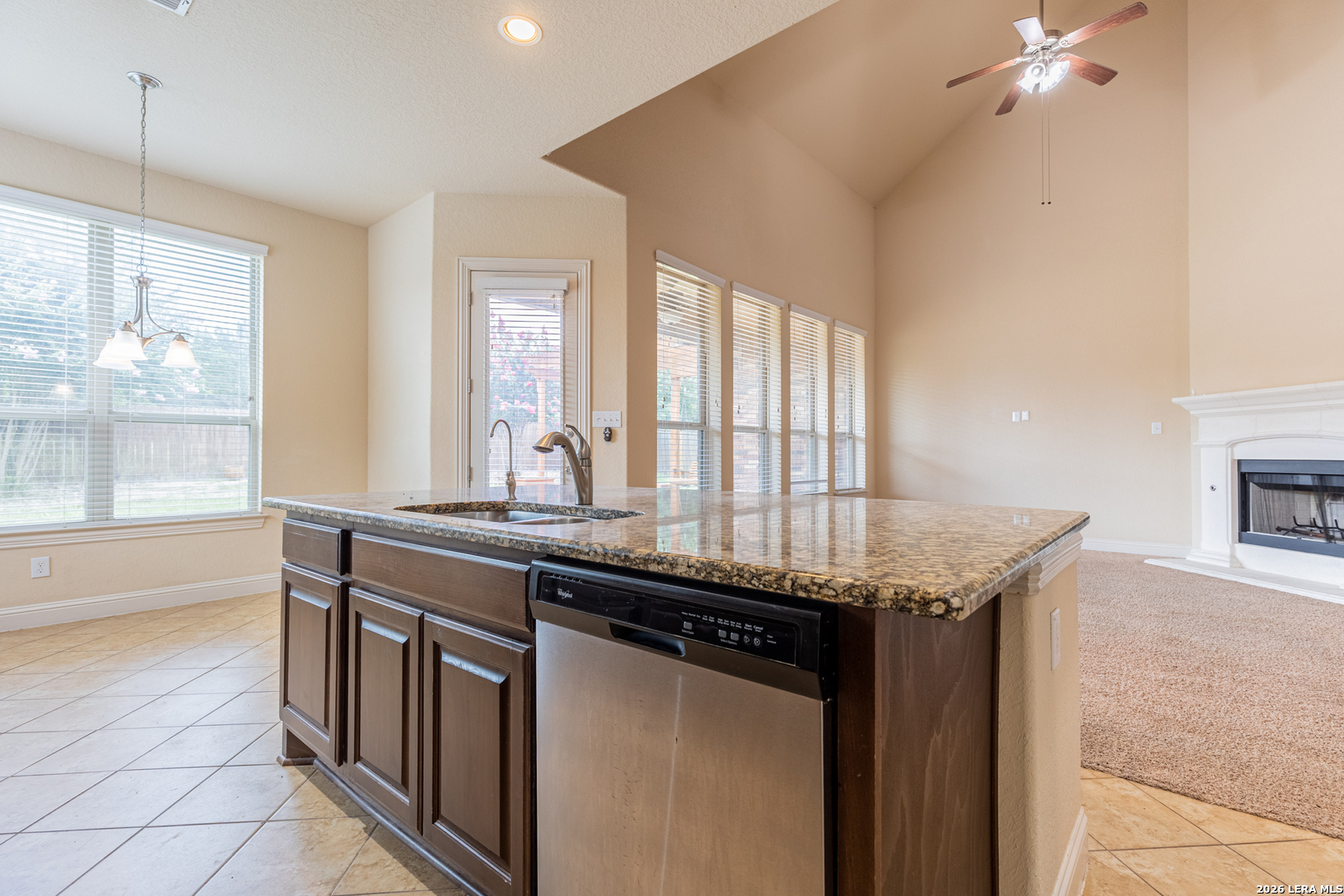 8103 Mystic Chase Boerne, TX 78015 - Photo 17 of 49 a kitchen with granite countertop a sink and a stove