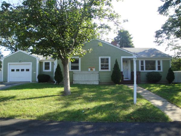 122 Bacon Road Barnstable, MA 02601 - Photo 1 of 18 a house that has a big yard in front of it