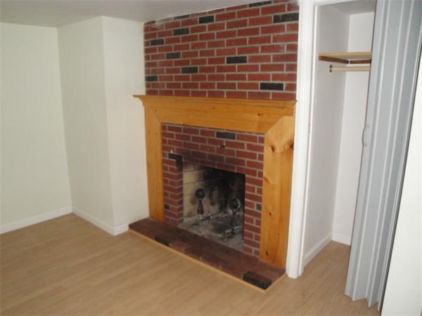 122 Bacon Road Barnstable, MA 02601 - Photo 11 of 18 a view of a fireplace in an empty room