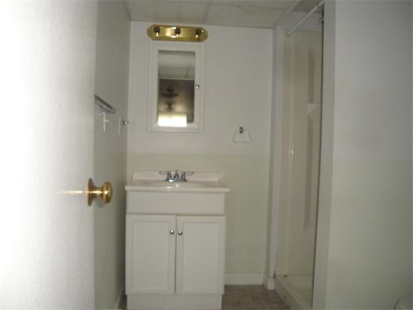 122 Bacon Road Barnstable, MA 02601 - Photo 12 of 18 a bathroom with a sink toilet and vanity
