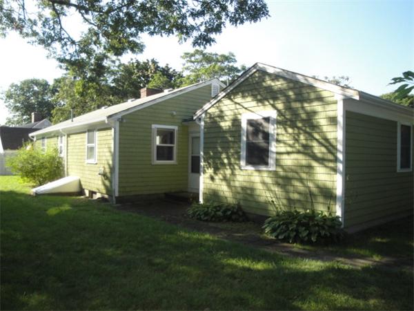 122 Bacon Road Barnstable, MA 02601 - Photo 16 of 18 a view of a back yard of the house