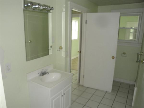 122 Bacon Road Barnstable, MA 02601 - Photo 8 of 18 a bathroom with a sink a toilet and shower