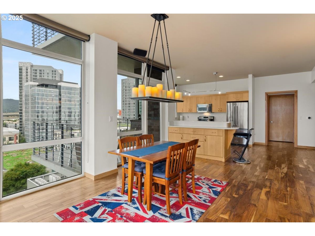1255 Northwest 9th Avenue, Unit 910 Portland, OR 97209 - Photo 13 of 43 a living room with furniture a rug and a table