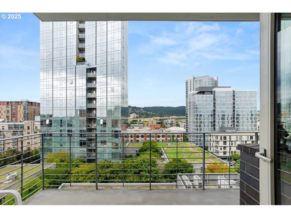 1255 Northwest 9th Avenue, Unit 910 Portland, OR 97209 - Photo 30 of 43 a view of city with tall buildings