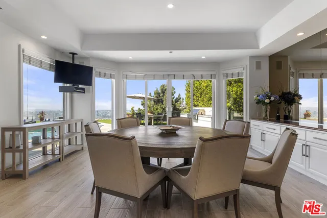 a bedroom with a bed and dresser