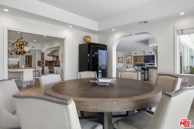 a bedroom with a bed and a fireplace