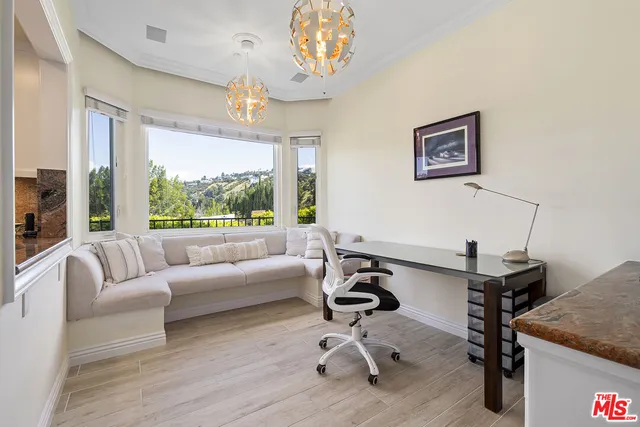 a swimming pool with outdoor seating and yard