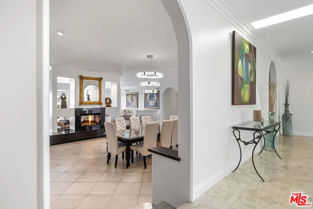 a view of a livingroom with furniture and a table