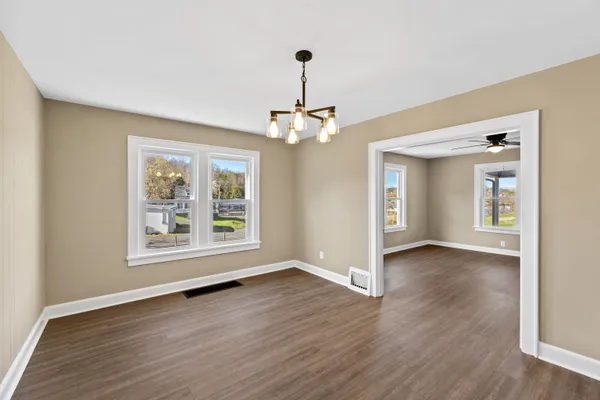 a view of a livingroom with wooden floor