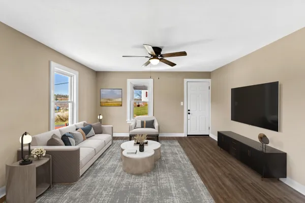 wooden floor in an empty room with a window