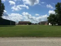 a view of a golf course with a garden
