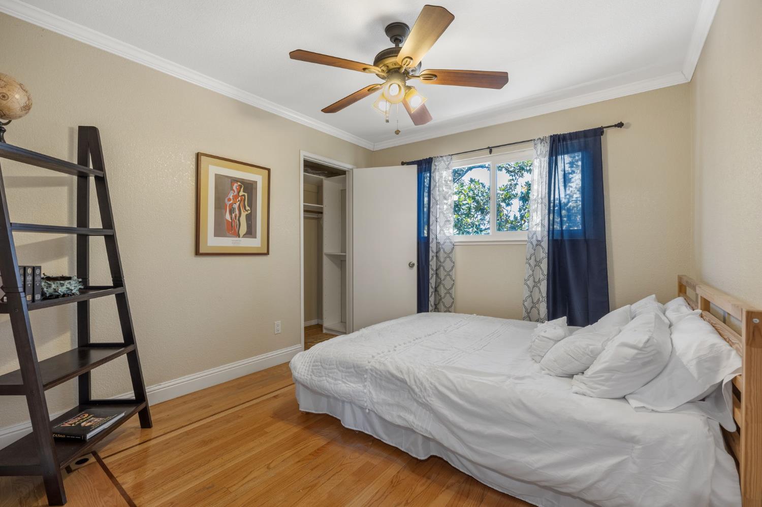 4206 Zephyr Way Sacramento, CA 95821 - Photo 30 of 45 a bedroom with a bed and a window