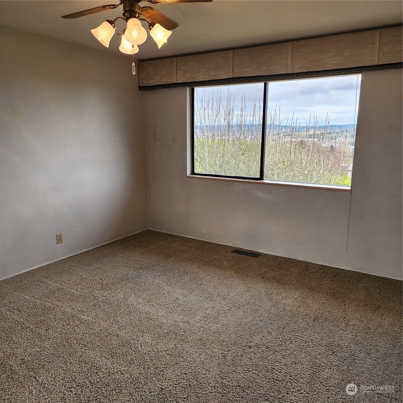 115 Monterey Place Northeast Renton, WA 98056 - Photo 13 of 35 an empty room with a window