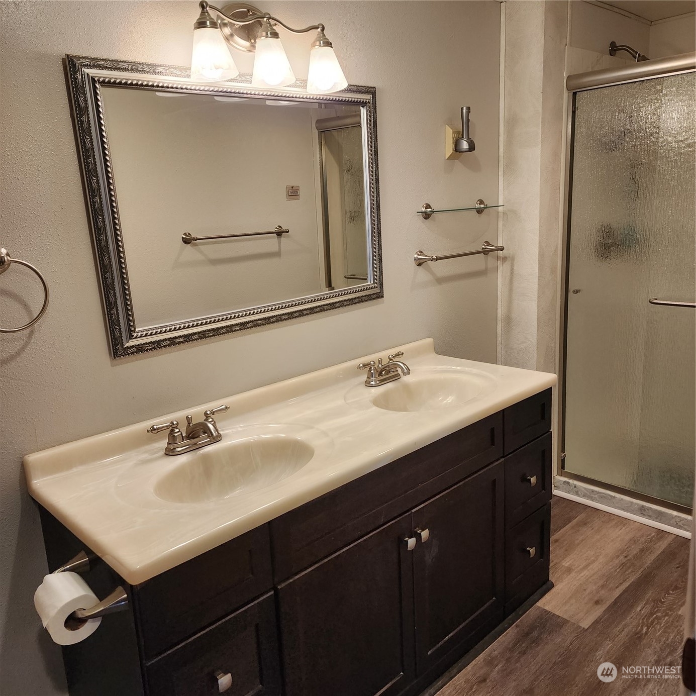 115 Monterey Place Northeast Renton, WA 98056 - Photo 19 of 35 a bathroom with a sink vanity and a mirror
