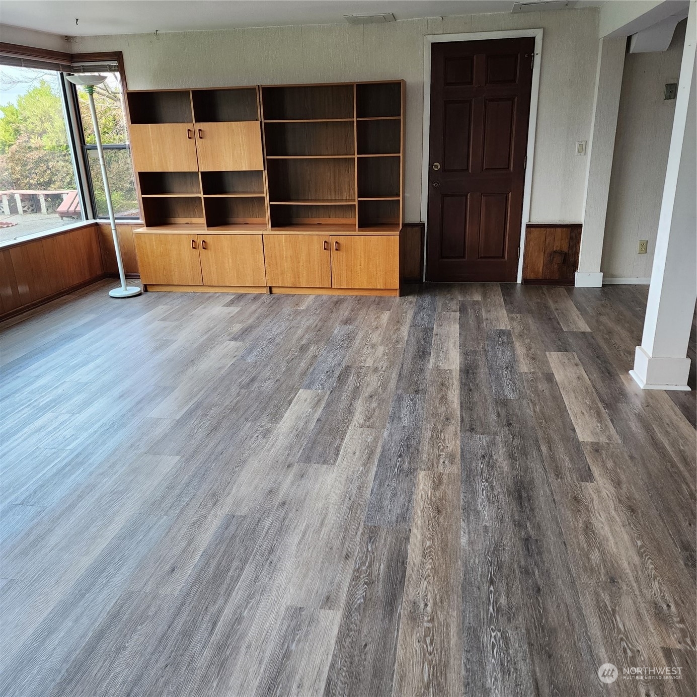 115 Monterey Place Northeast Renton, WA 98056 - Photo 21 of 35 wooden floor in an empty room with a window