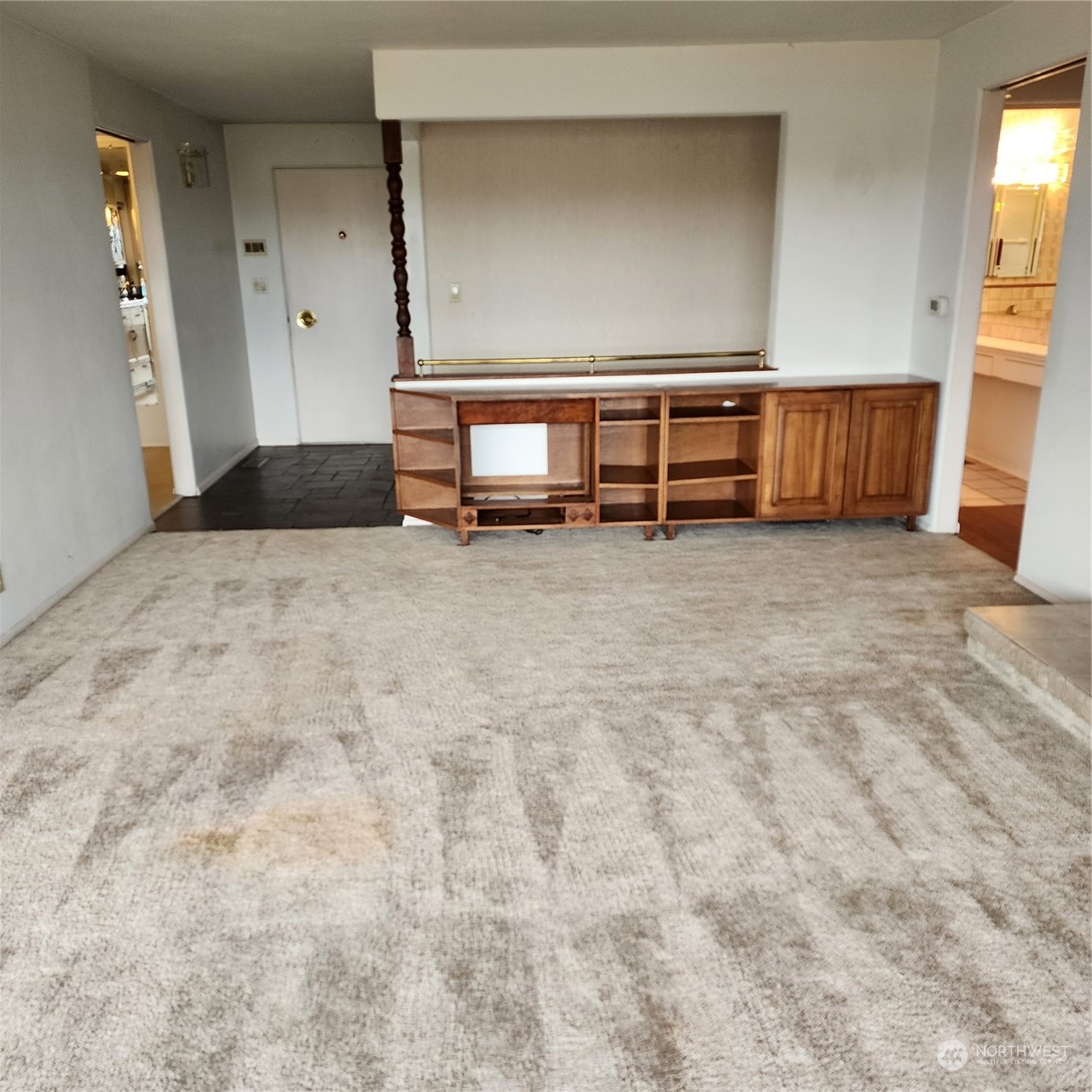 115 Monterey Place Northeast Renton, WA 98056 - Photo 8 of 35 a view of an empty room with closet and windows