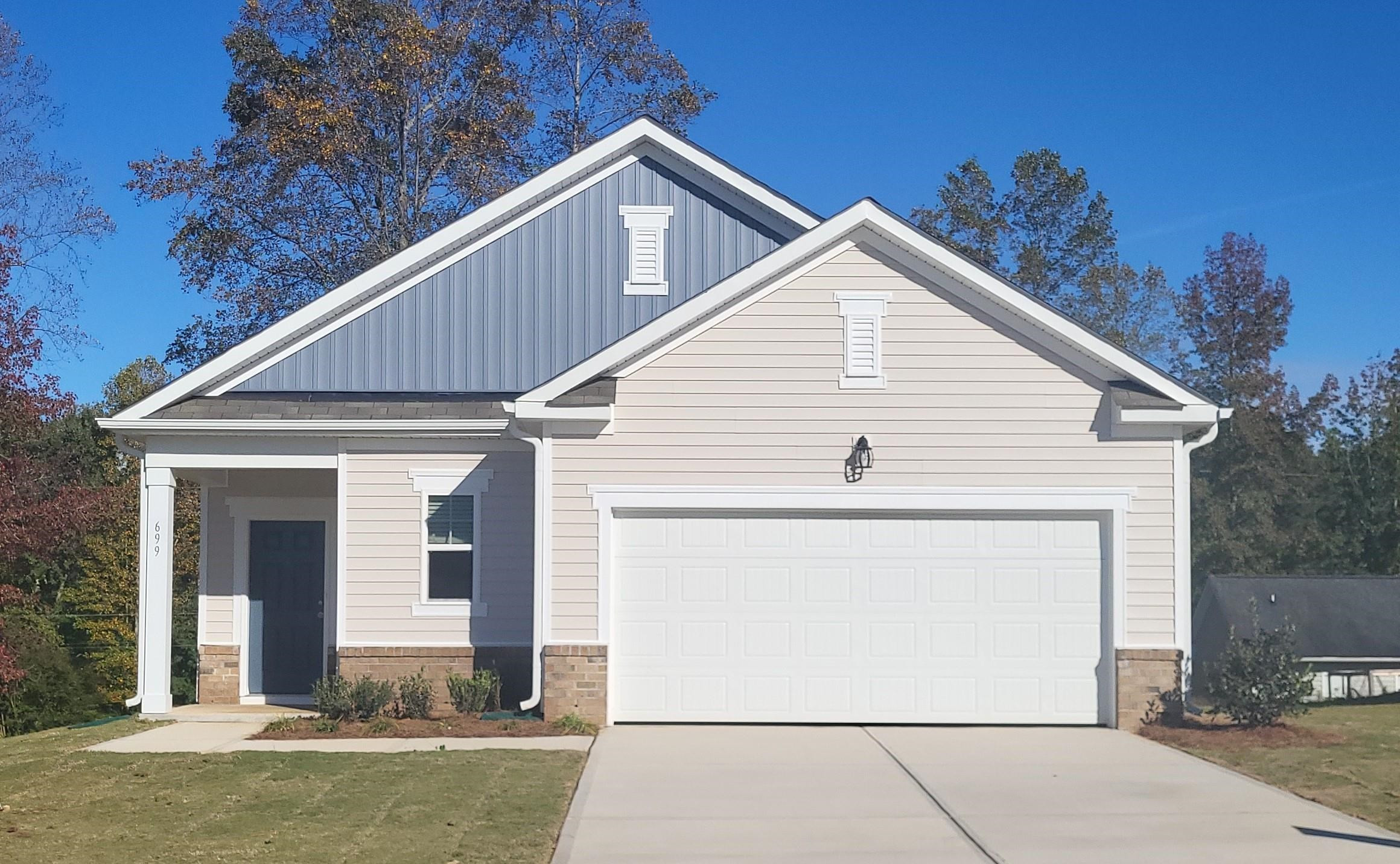 a view of a house with a garage