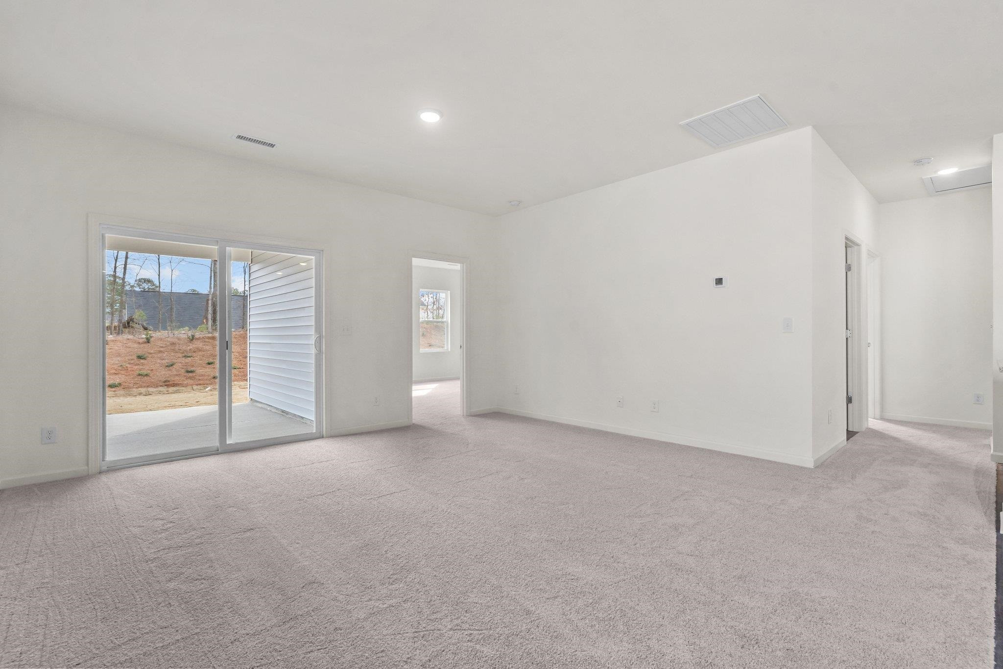 699 Cessna Drive Spring Hope, NC 27882 - Photo 17 of 29 a view of an empty room with a window