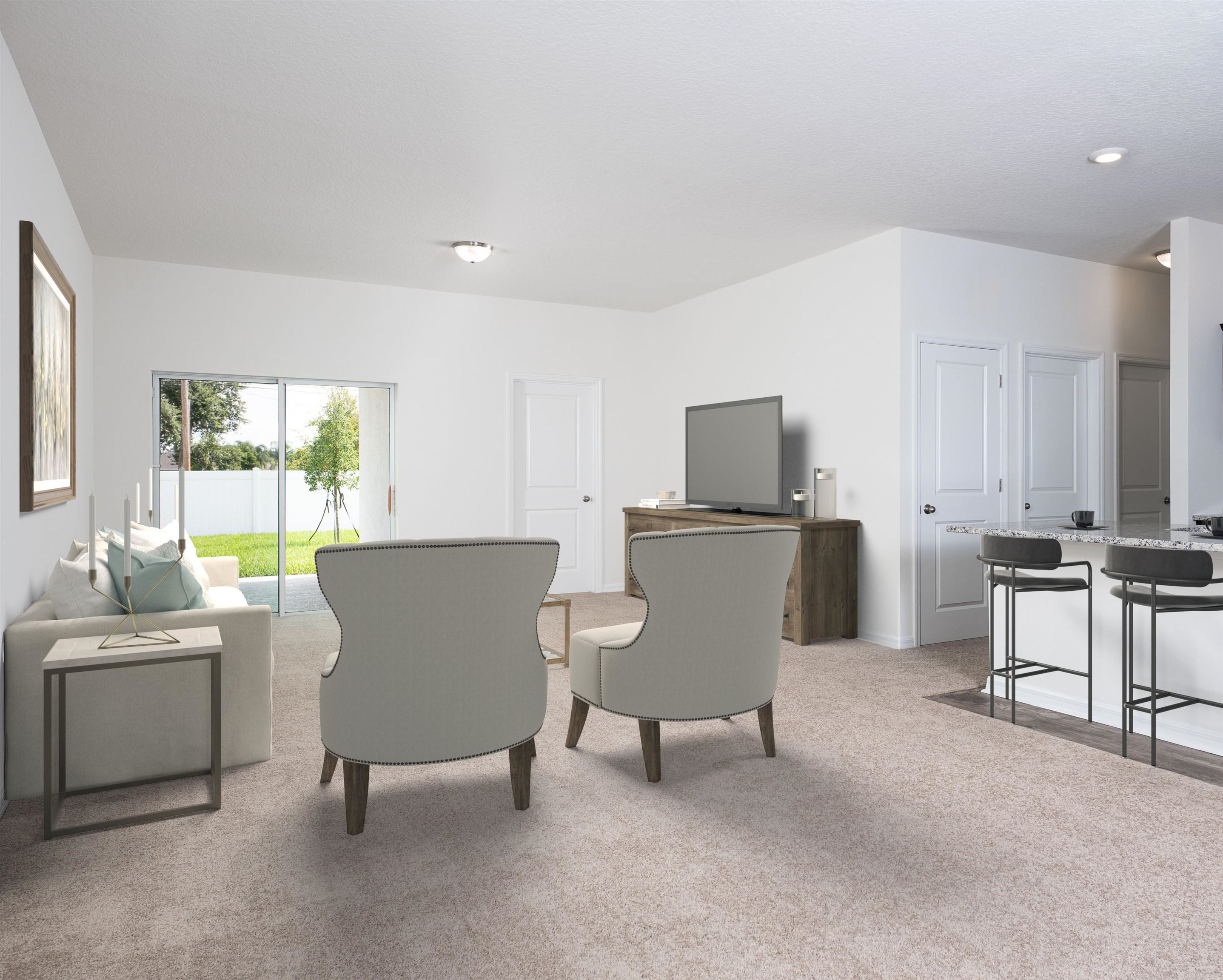 699 Cessna Drive Spring Hope, NC 27882 - Photo 4 of 29 a living room with furniture a window and a table