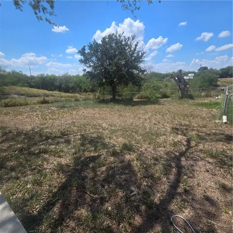 a view of a lake with sunset