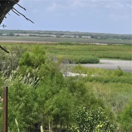a view of an outdoor space and a lake view