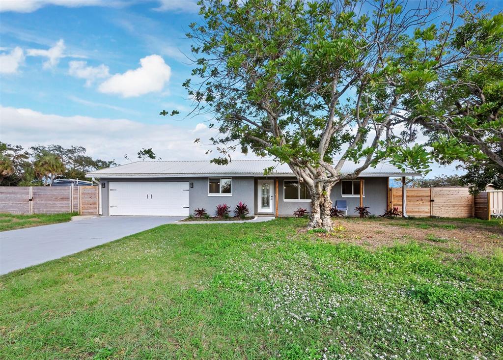 2651 Mallow Road Venice, FL 34293 - Photo 1 of 1 a view of a house with a yard and sitting area
