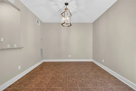 a view of a room with rack on the wall