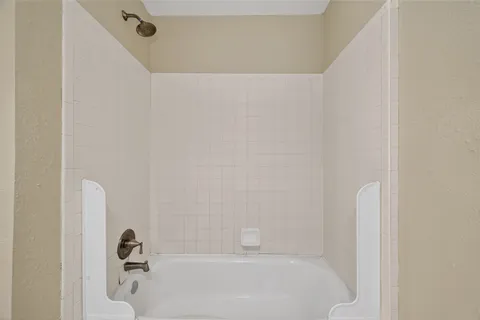 a bathroom with a bathtub