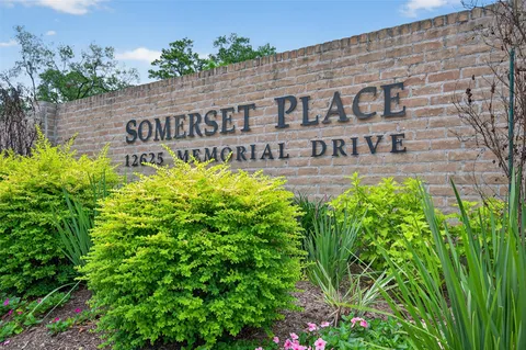 a view of a building with a garden