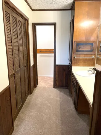 a view of a kitchen with a sink