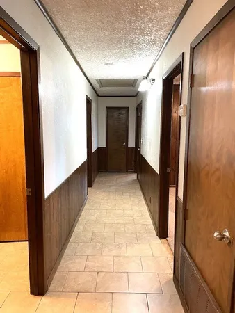 a view of gallery with windows