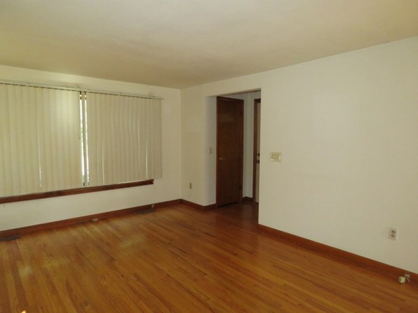 747 North Branch Parkway Springfield, MA 01119 - Photo 12 of 18 a view of an empty room with wooden floor