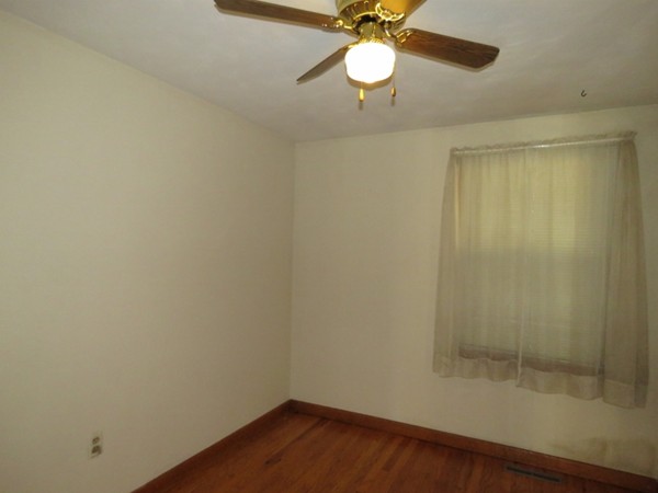 747 North Branch Parkway Springfield, MA 01119 - Photo 13 of 18 a view of a room with wooden floor and fan