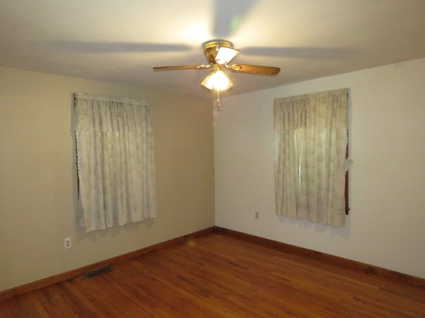 747 North Branch Parkway Springfield, MA 01119 - Photo 15 of 18 a view of an empty room with wooden floor