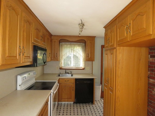 747 North Branch Parkway Springfield, MA 01119 - Photo 18 of 18 a bathroom with a sink a mirror and shower