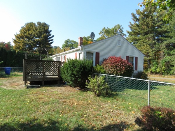 747 North Branch Parkway Springfield, MA 01119 - Photo 5 of 18 a view of a house with a yard and a garden