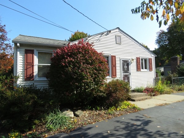 747 North Branch Parkway Springfield, MA 01119 - Photo 7 of 18 a view of a house with a yard and potted plants
