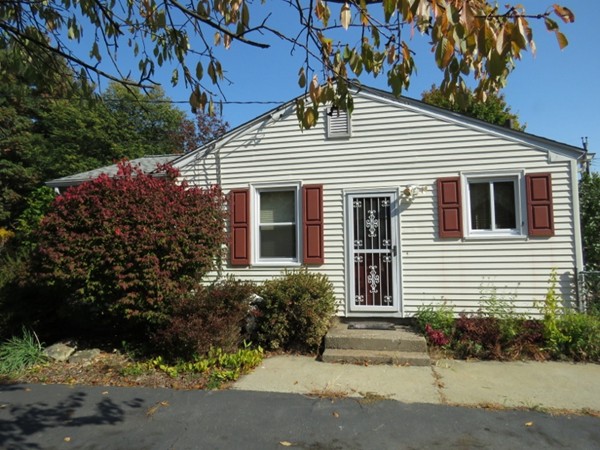 747 North Branch Parkway Springfield, MA 01119 - Photo 8 of 18 a front view of a house with a yard