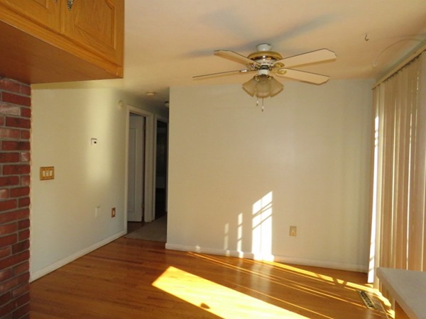 747 North Branch Parkway Springfield, MA 01119 - Photo 9 of 18 a view of a room with wooden floor and door