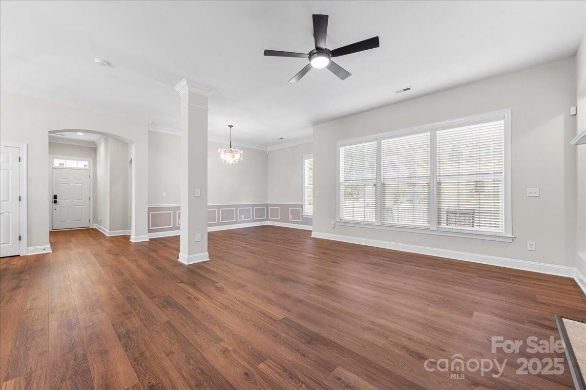 4148 Cedar Point Avenue Matthews, NC 28104 - Photo 13 of 48 a view of empty room with wooden floor and window