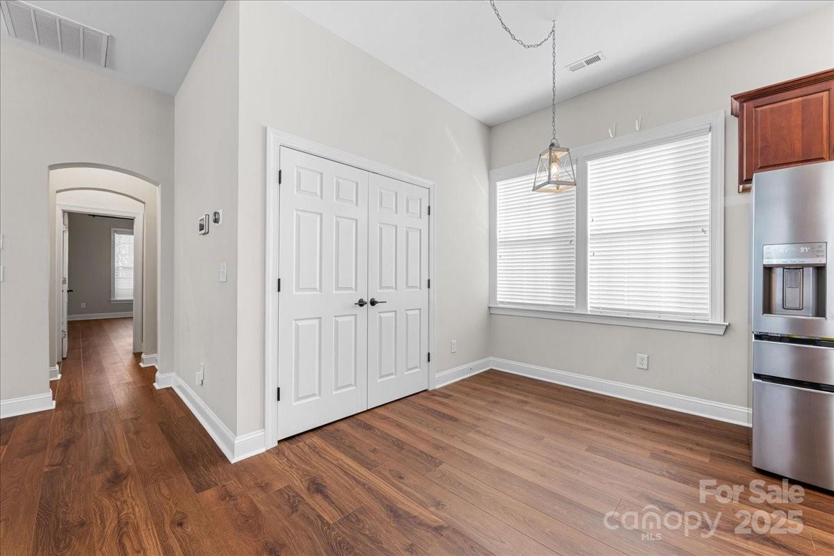 4148 Cedar Point Avenue Matthews, NC 28104 - Photo 24 of 48 a view of empty room with wooden floor and fan