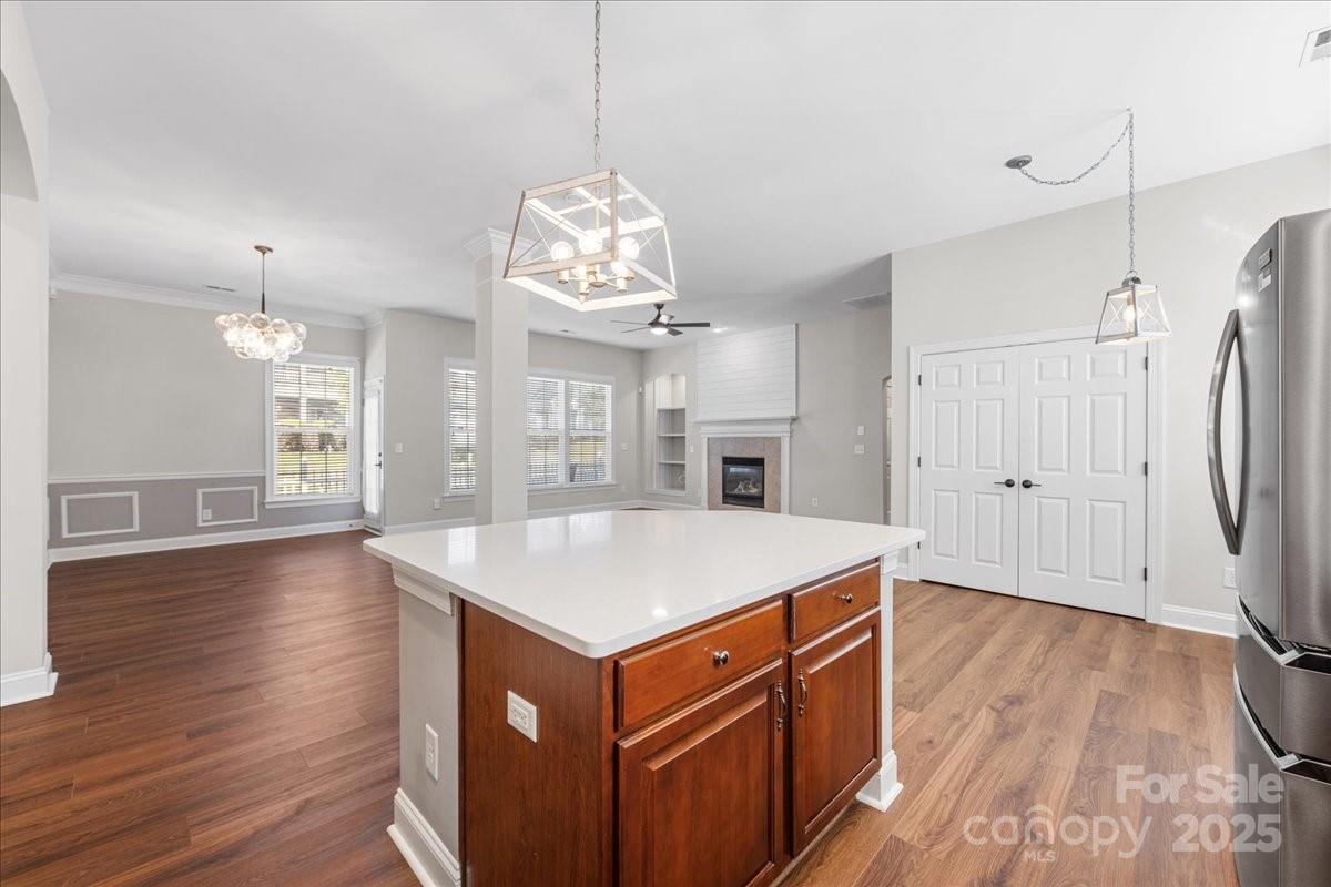 4148 Cedar Point Avenue Matthews, NC 28104 - Photo 26 of 48 a view of a kitchen wooden cabinets and wooden floor