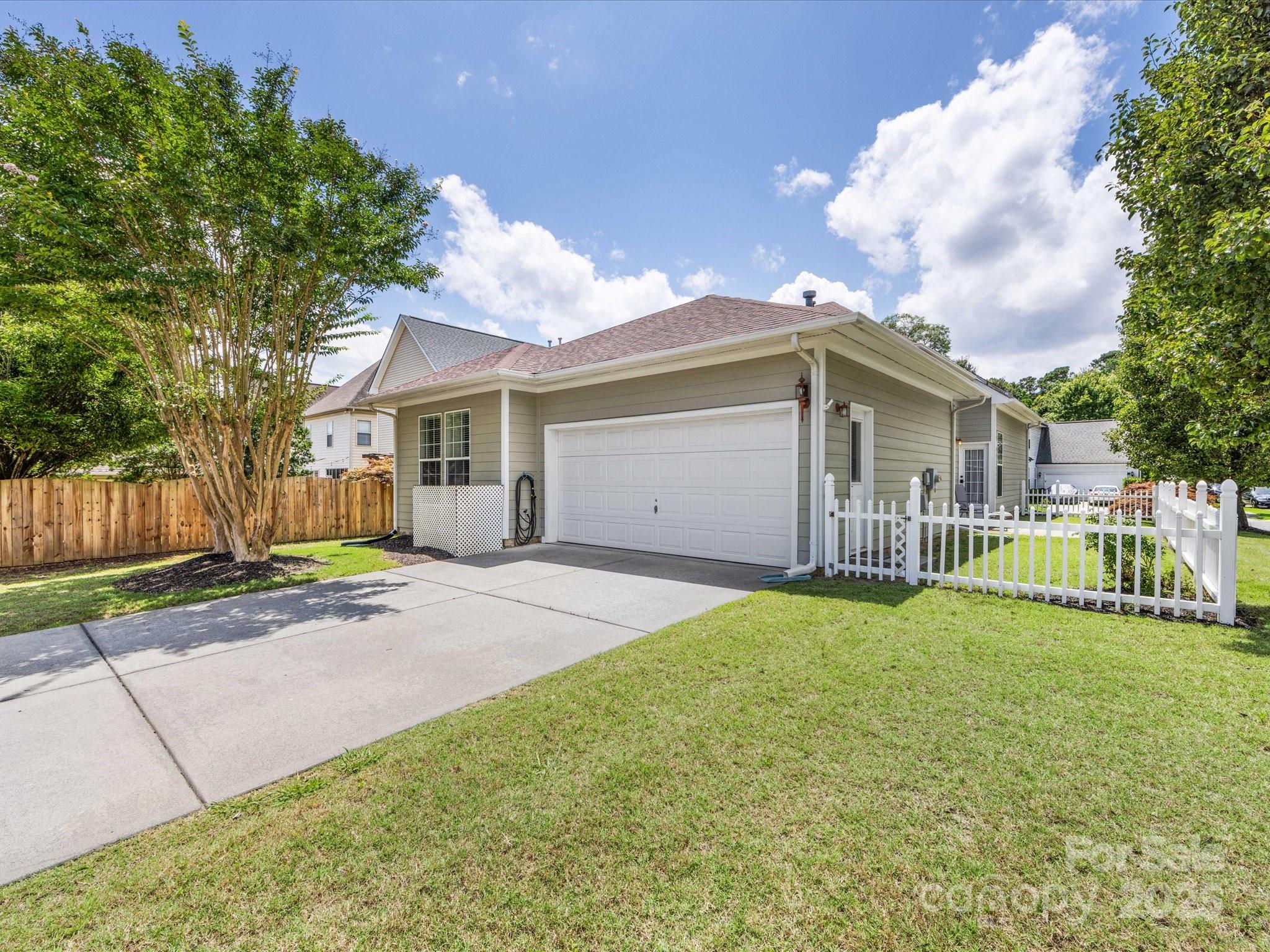4148 Cedar Point Avenue Matthews, NC 28104 - Photo 39 of 48 a view of a house with a yard and large tree